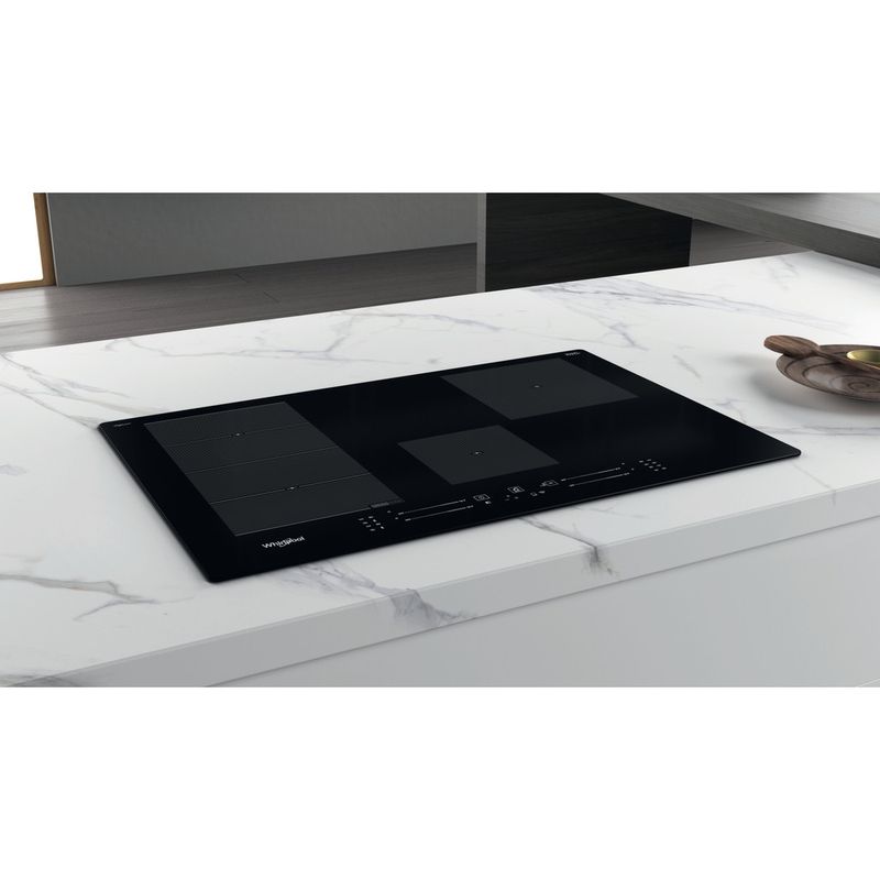 Whirlpool Piano cottura WF S5077 NE/IXL Nero Induction vitroceramic Lifestyle perspective